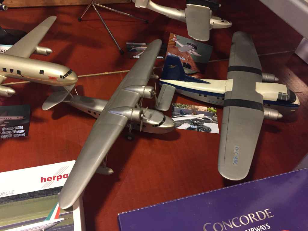 Close up view of the wooden ID models of Pan American flying boat and Aeropostal Bristol Freighter.