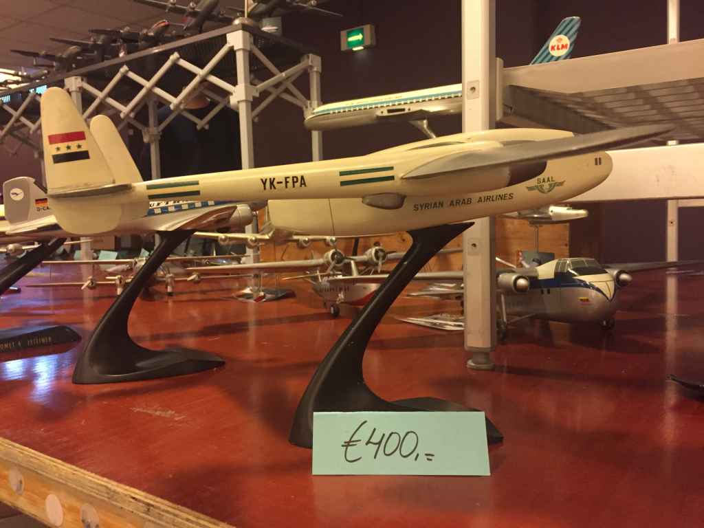 This is believed to be a wooden ID model of a C-119 that was possibly refinished by Verkuyl into Syrian Arab Airlines livery. It sits on a Verkuyl base.