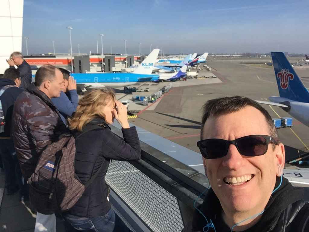 Henry Tenby thoroughly enjoying his time soaking up the action on the open air observation deck at Amsterdam Schiphol airport.