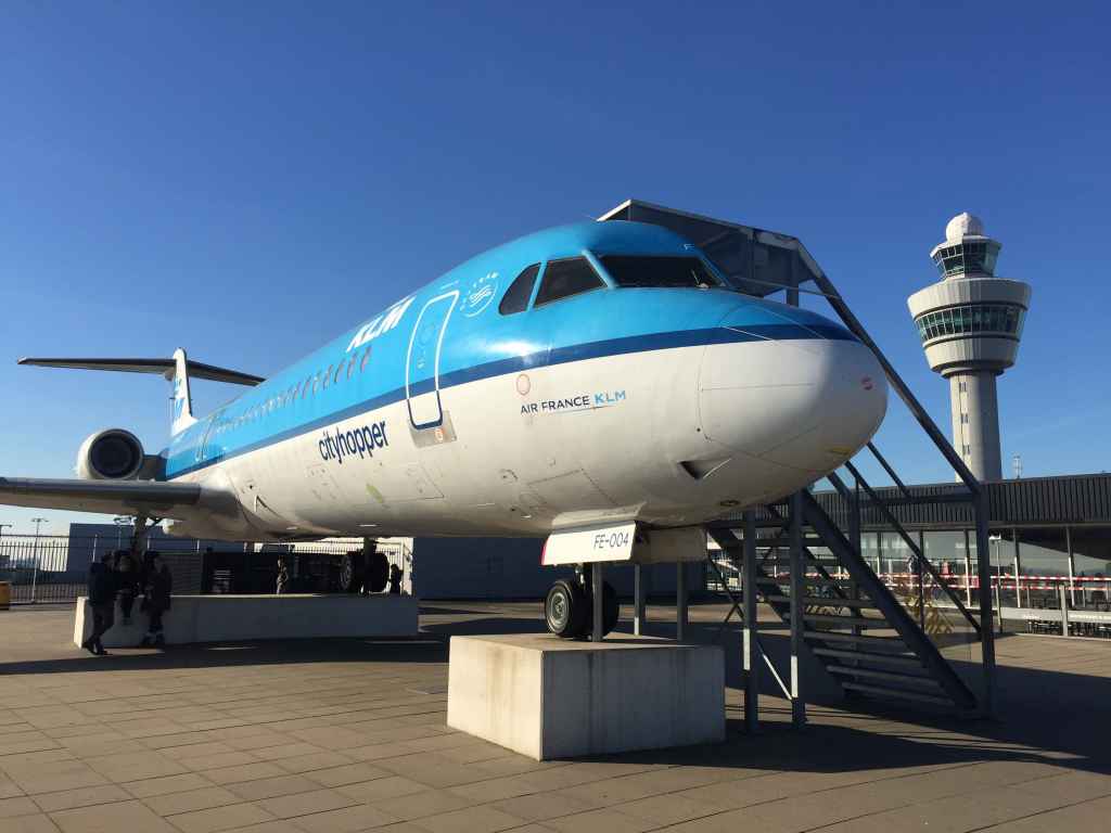 Why not take a visit to the KLM Fokker 100 that sits atop the observation deck at Amsterdam Schiphol airport. You can take a seat to rest your feet, or view the flight deck.