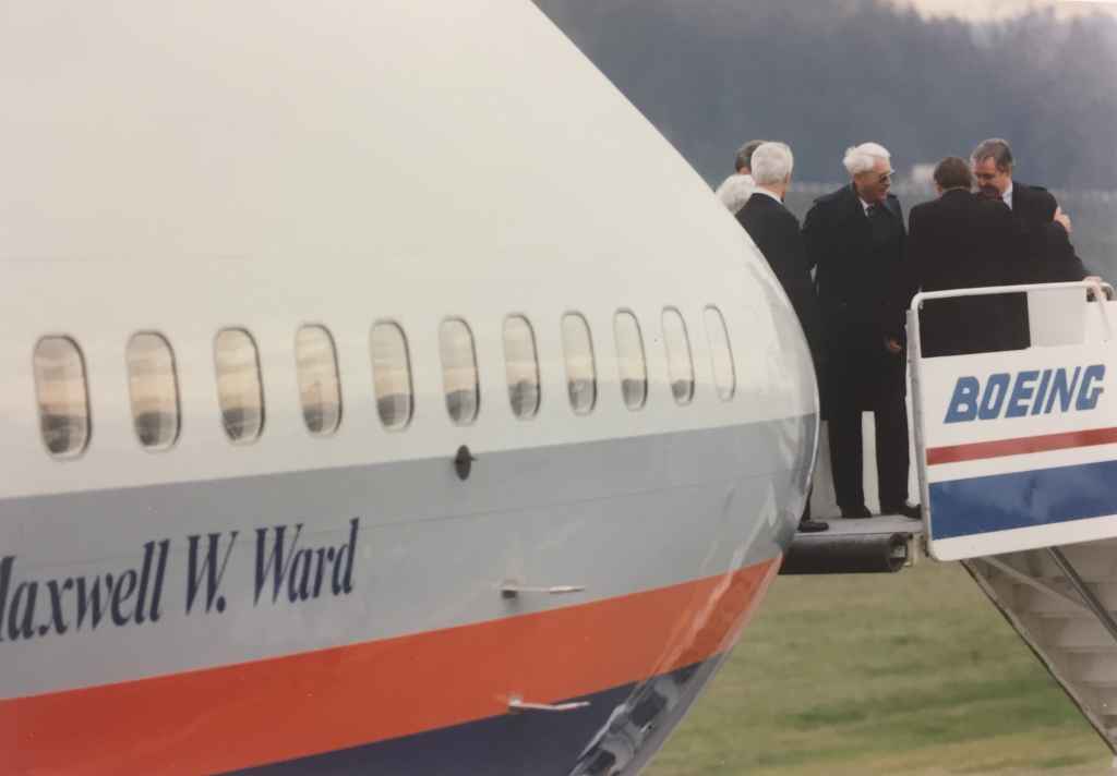 Max Ward's wife and Rhys Eyton and others christening Canadian Airlines' first Boeing 747-475 "Maxwell Ward" at Boeing Field, December 13, 1990, prior to delivery to Vancouver.