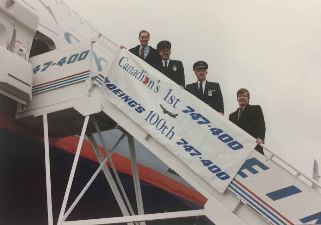 Kevin Jenkins top of the stairs, with CAIL air crew of Canadian Airlines' first Boeing 747-475 "Maxwell Ward" at Boeing Field, December 13, 1990, prior to delivery to Vancouver.