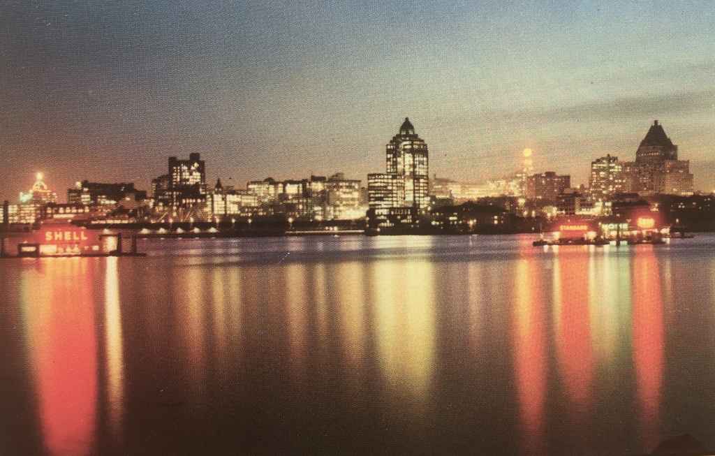 Vancouver, BC, Canada waterfront view at dusk circa 1954. (Kodachrome postcard published by The Coast Publishing Company, Vancouver, BC)